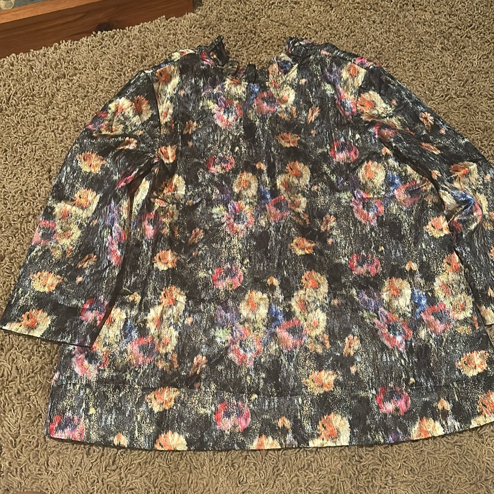 Women's Tuckernuck top that zips up in the back and two ties for a bow